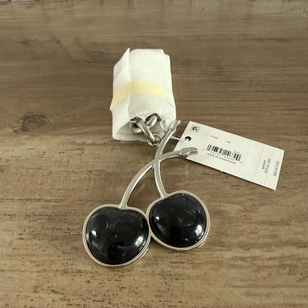 NWT Coach Cherry Bag Charm keychain black silver with a dust bag CT392